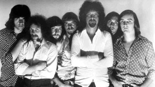 Electric Light Orchestra posing for a photograph in the mid-70s