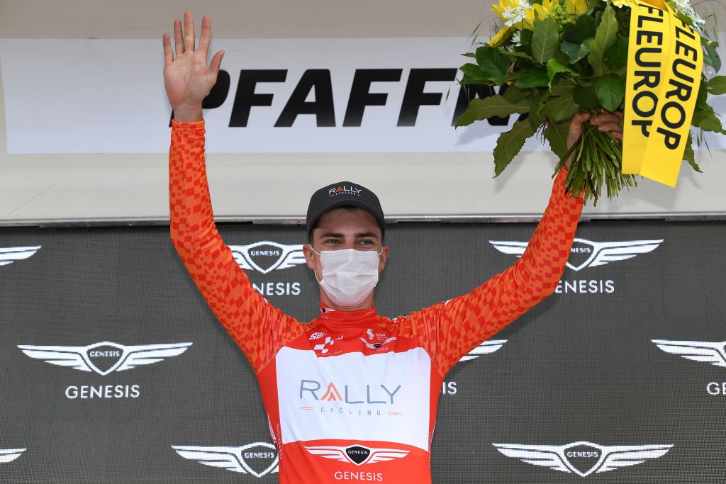 PFAFFNAU SWITZERLAND JUNE 08 Nick Zukowsky of Canada and Team Rally Cycling Orange Mountain Jersey celebrates at podium during the 84th Tour de Suisse 2021 Stage 3 a 185km stage from Lachen to Pfaffnau 509m UCIworldtour tds tourdesuisse on June 08 2021 in Pfaffnau Switzerland Photo by Tim de WaeleGetty Images