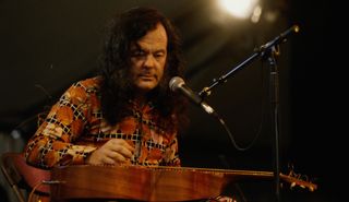 David Lindley performs onstage at the New Orleans Jazz and Heritage Festival on April 30, 1994