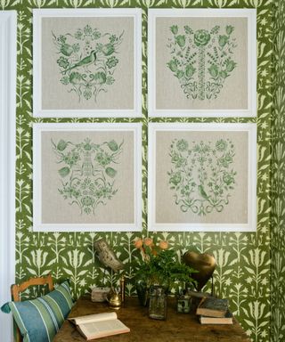 Gallery wall on green maximalist wallpaper