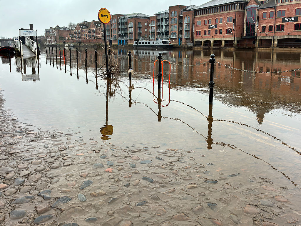 The River Ouse shows high water levels partially submerging riverside footpaths in York, England, United Kingdom, on December 21, 2025