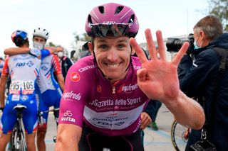 TOPSHOT Team GroupamaFDJ rider Frances Arnaud Demare wearing the best sprinters mauve jersey celebrates after winning the 11th stage of the Giro dItalia 2020 cycling race a 182kilometer route between Porto SantElpidio and Rimini on October 14 2020 Frenchman Arnaud Demare of the GroupamaFDJ team powered to his fourth stage win in this years Giro dItalia winning stage 11 at Rimini on October 14 2020 Photo by Fabio FERRARI POOL AFP Photo by FABIO FERRARIPOOLAFP via Getty Images