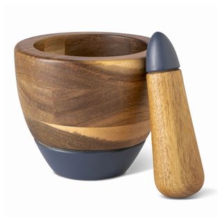 Wooden and grey pestle and mortar