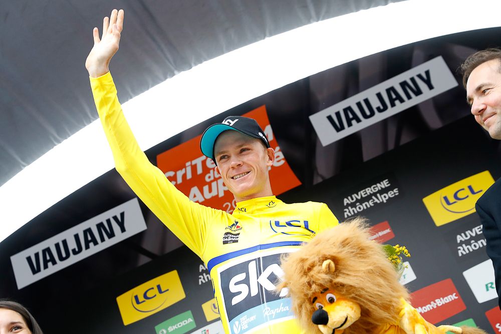 Chris Froome in yellow on the stage 5 podium at Criterium du Dauphine