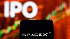 SpaceX logo on a smartphone with a blurred stock chart and the word "IPO" in the background for SpaceX IPO