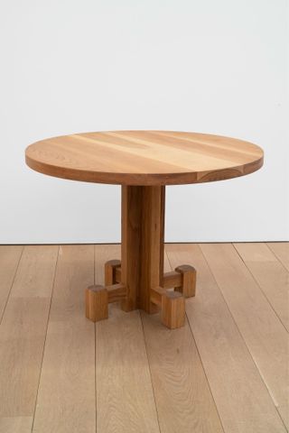 Round wooden table by ryan preciado