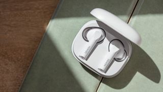 Denon AH-C840NCW earbuds in a white case