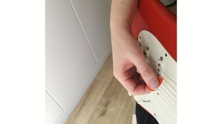 Funk guitar strumming – hand position