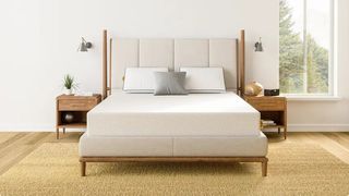 Image shows the Nolah Original 10 Mattress on a beige bedframe and placed on a jute rug