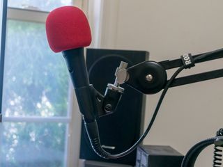 A Microphone with a big red nose