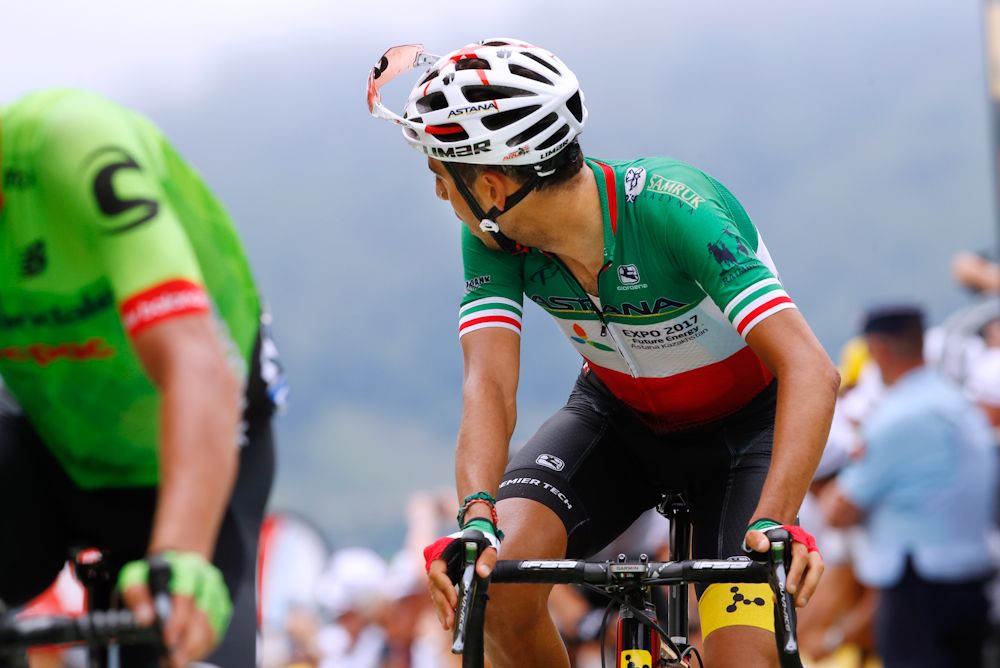 Fabio Aru checks back for Chris Froome at the finish of stage 12 at the Tour de France