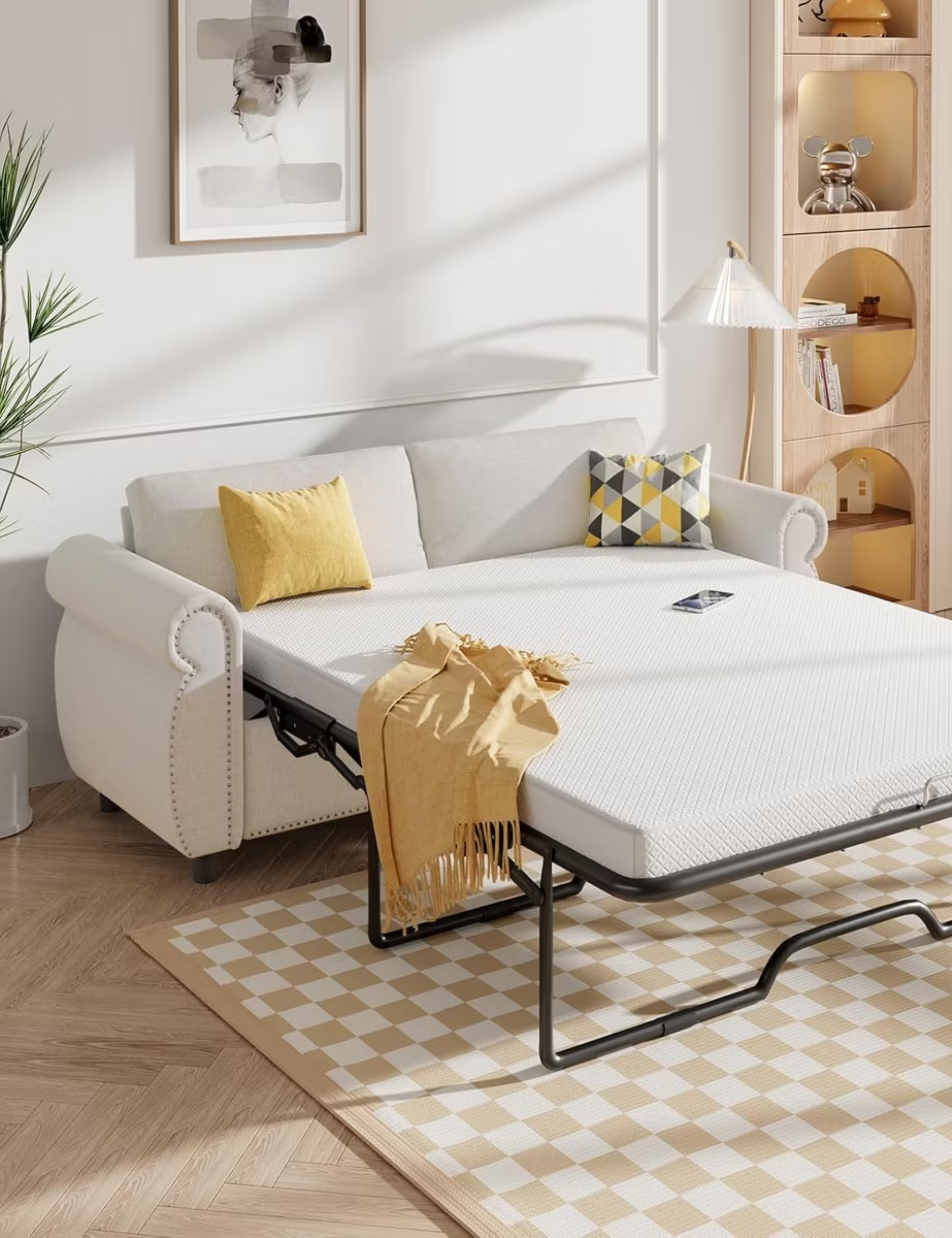 Neutral Target sleeper sofa pulled out, exposing its mattress frame, atop of a beige and white checkerboard rug