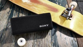 Sony ULT Field 3 next to a skateboard