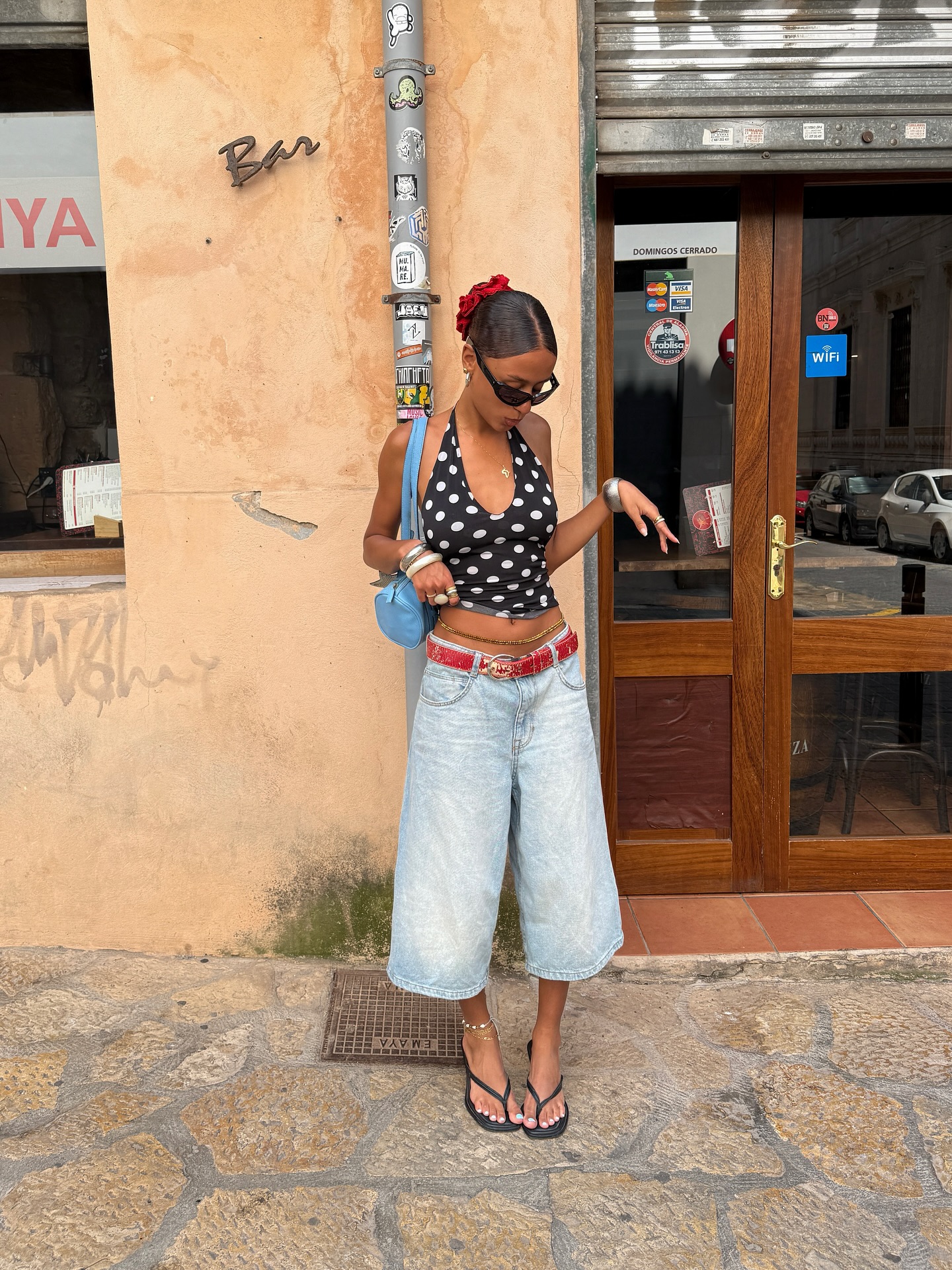 An image of @elisasgn wearing a polka-dot halter.