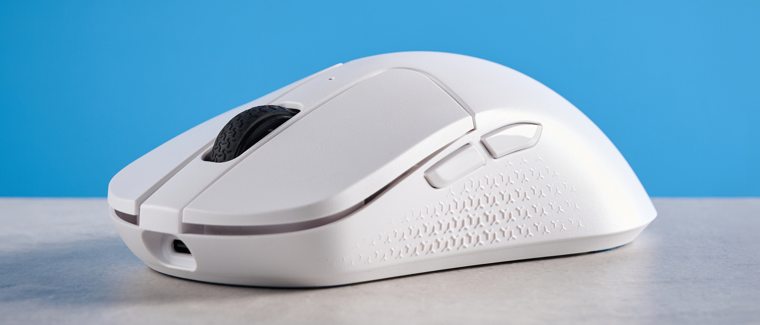 A white Keychron M3 Mini 8K gaming mouse