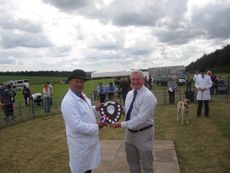 Robin-Vestey-Master-of-the-Thurlow-presenting-Sean-Hutchinson-with-the-Essex-County-Shield-for-the-Supreme-Champion-Hound-Suffolk-Bonfire..jpg