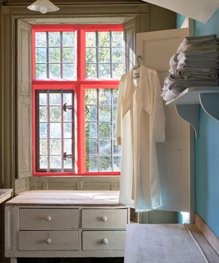 utility room with coral window frame