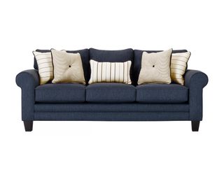 A navy blue queen sleeper sofa with scroll arms and cream scatter cushions