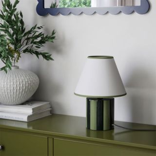 Green M&S Lola lamp on green sideboard