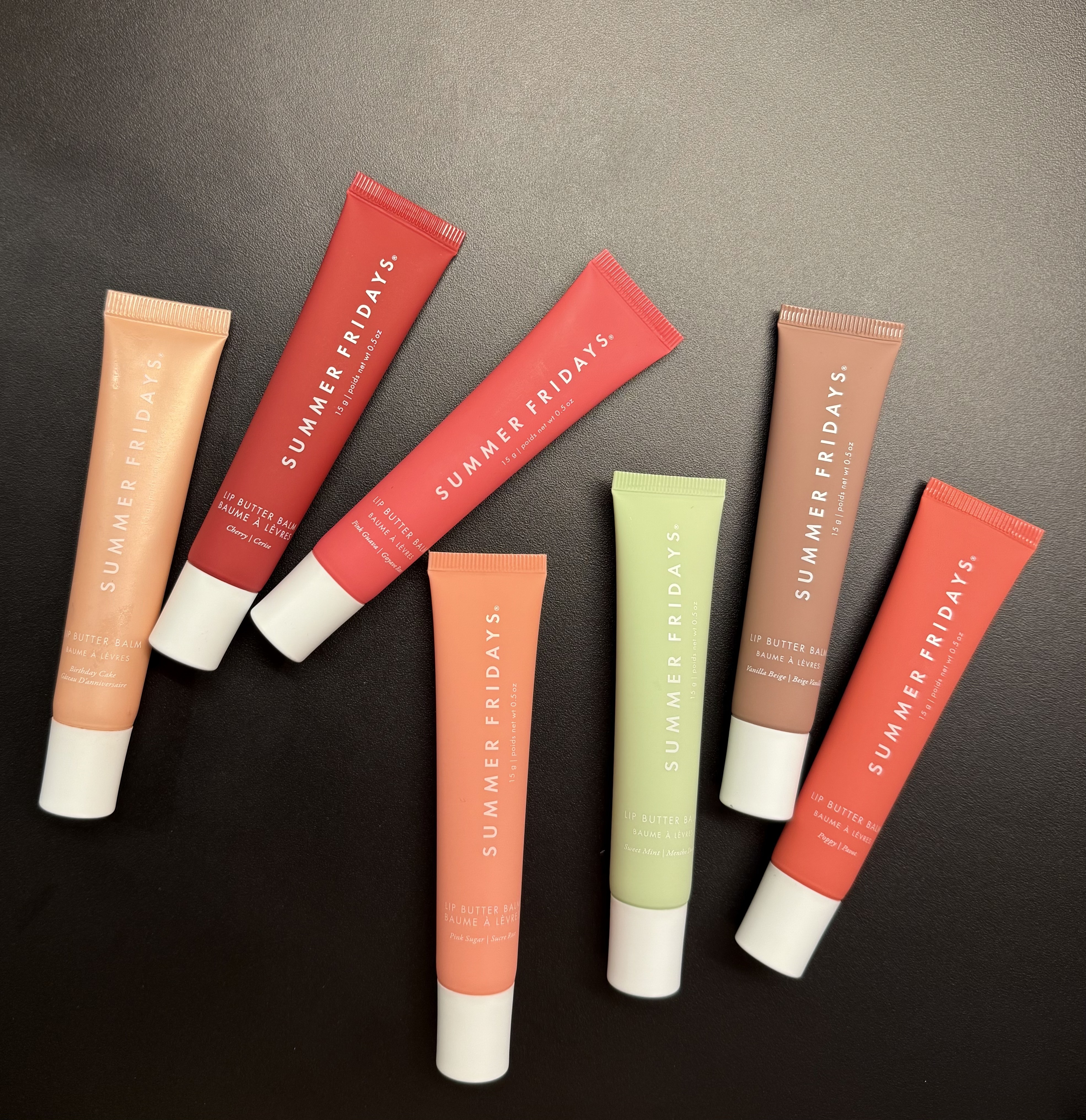Jamie Schneider testing Summer Fridays Lip Butter Balms.
