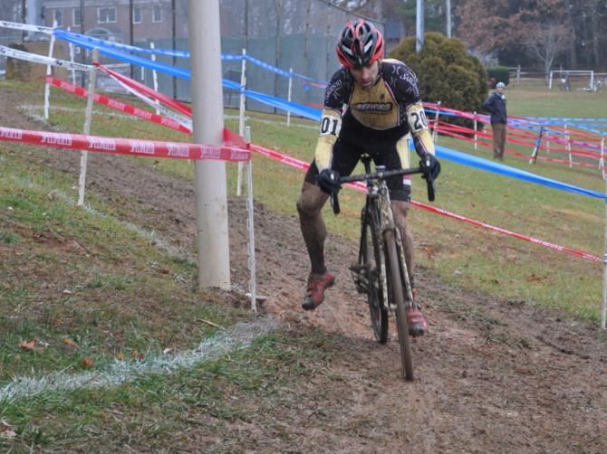 Brian Matter (RACC p/b Geargrinder) outriggers it on an off-camber section.