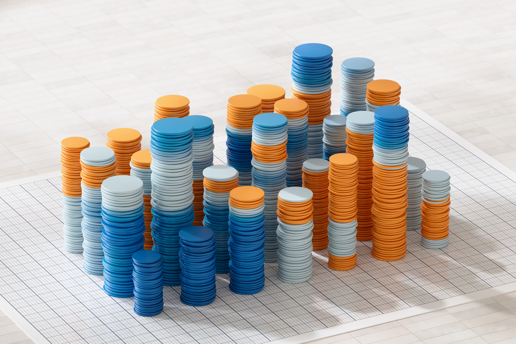 stacks of blue, white and orange discs on a financial chart symbolising exchange-traded funds (ETFs)