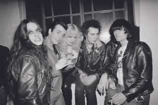 Road to ruin: Dee Dee hangs out with Sid, Nancy and pals in New York, December 1977.