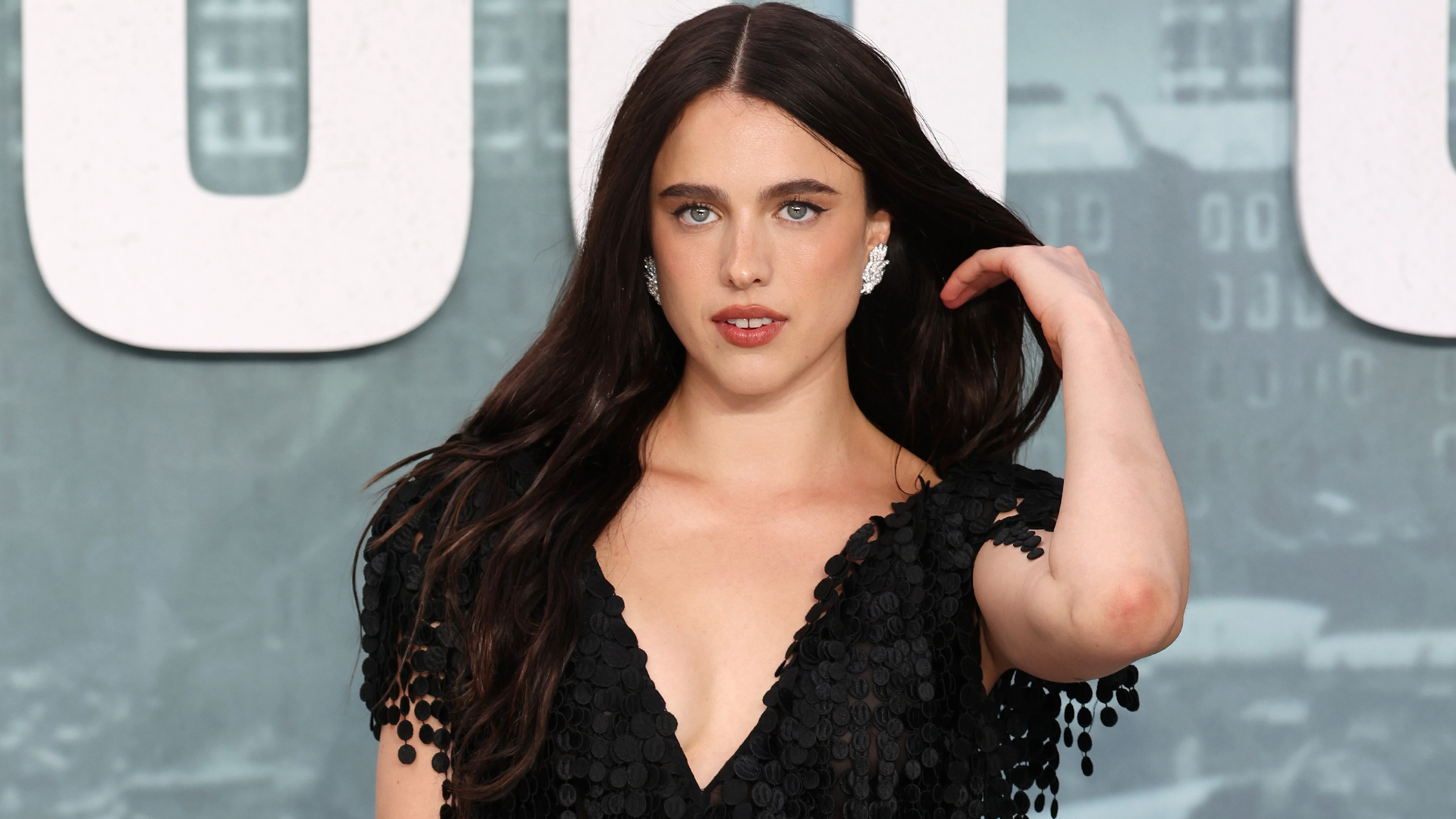 Margaret Qualley styled the barefoot Chanel sandals at the premiere of 'The Dog Stars'