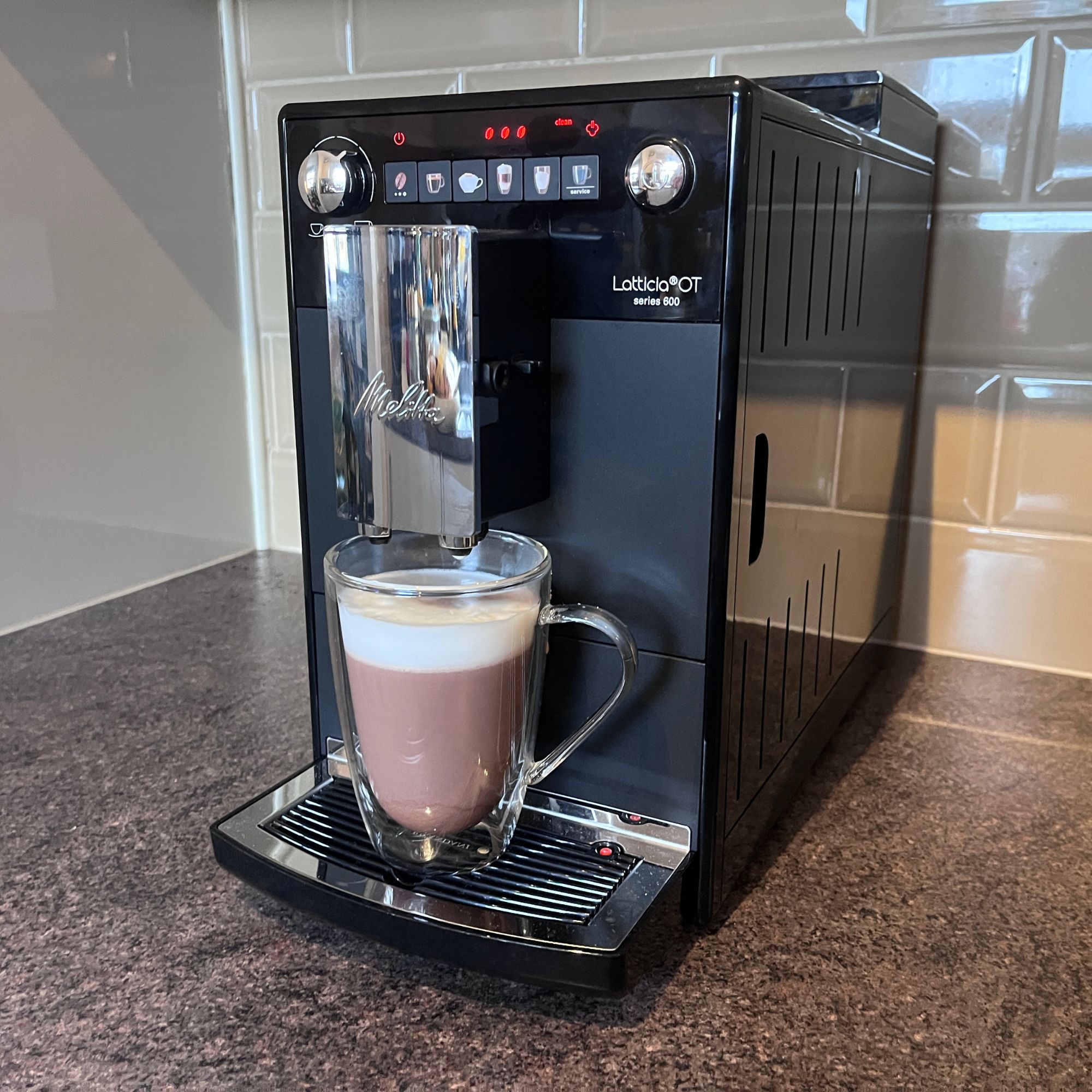 Melitta Latticia OT Bean-to-Cup Coffee Machine making steamed milk for hot chocolate