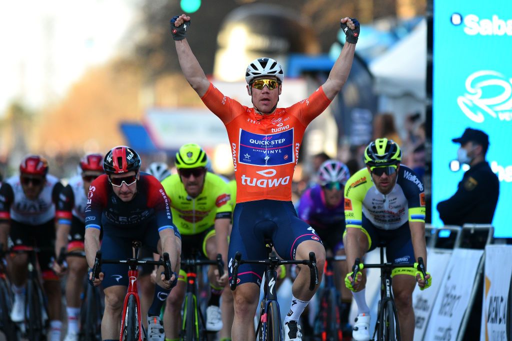 VALENCIA SPAIN FEBRUARY 06 Fabio Jakobsen of Netherlands and Team QuickStep Alpha Vinyl Orange Points Jersey celebrates winning during the 73rd Volta A La Comunitat Valenciana 2022 Stage 5 a 92km stage from Paterna to Valencia VCV2022 on February 06 2022 in Valencia Spain Photo by Dario BelingheriGetty Images