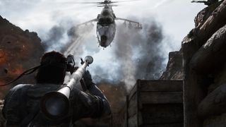 Promotional screenshot of Naked Snake shooting a rocket at a helicopter in Metal Gear Solid Delta: Snake Eater