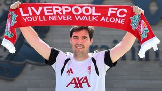 Andoni Iraola, the new manager for English Premier League football side Liverpool, poses as he meets the media at the team's training ground in Kirkby, Liverpool, north-west England on July 13, 2026