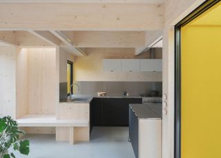 timber and bright yellow colour enriches London house extension by Unknown Works architects