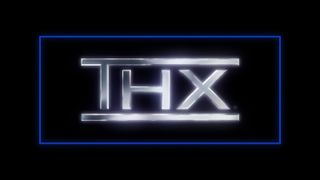 THX logo in metallic font on black background, surrounded by blue rectangular framing