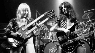 Rush’s Geddy Lee and Alex Lifeson performing onstage in the 1970s
