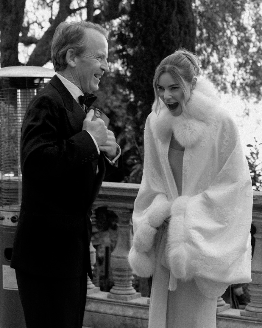an image of georgie and her dad at the wedding.