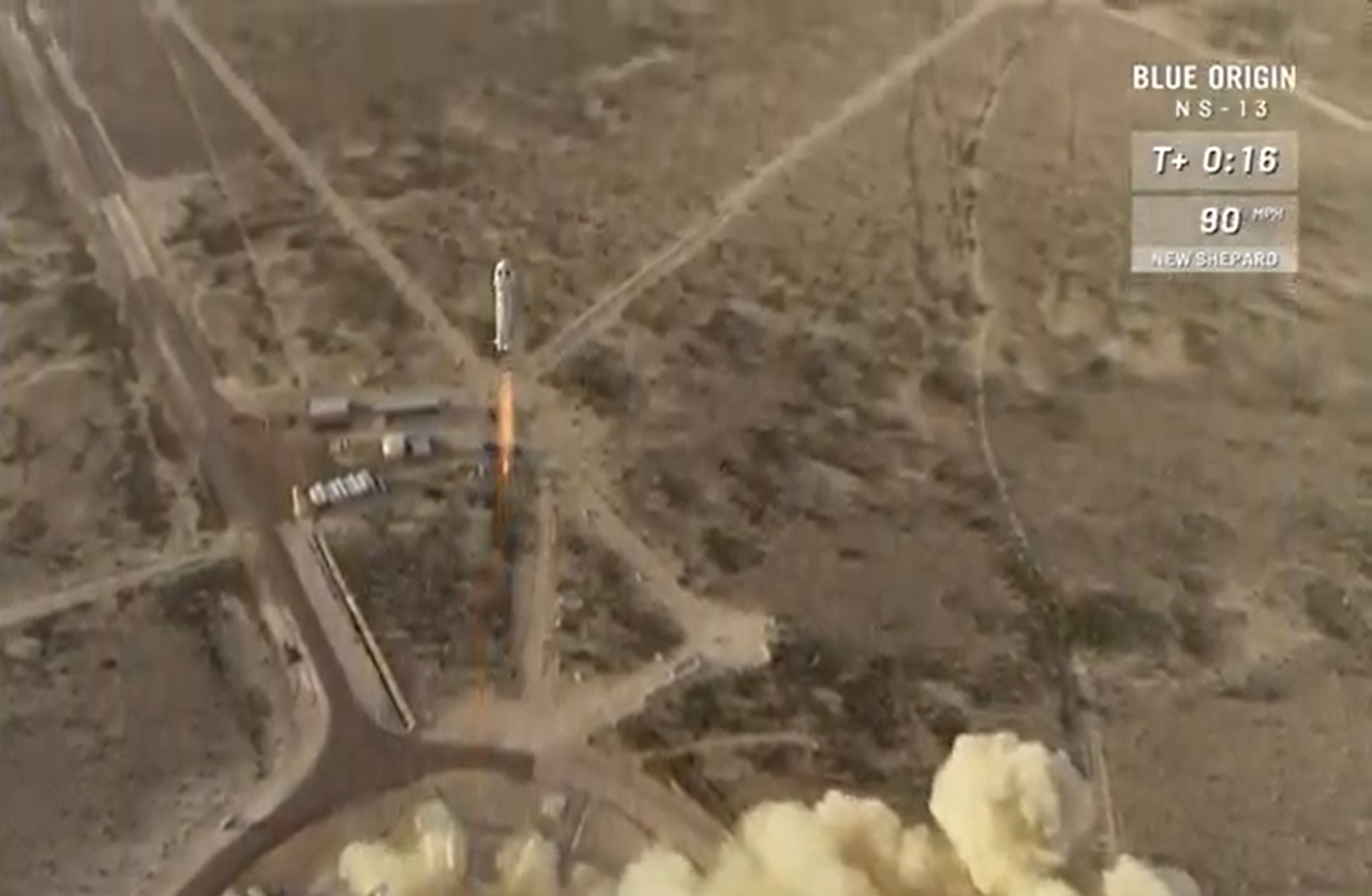 Blue Origin's New Shepard vehicle blasting off from the launch pad on Oct. 13, 2020.