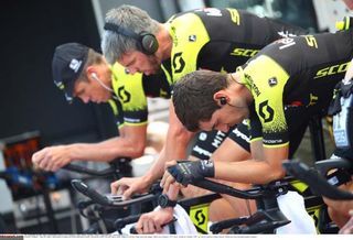 The riders from Mitchelton Scott warm up