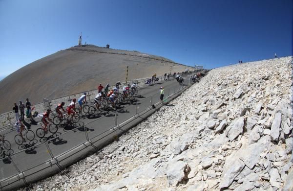 A group make their way up towards the fabled summit of Mont Ventoux