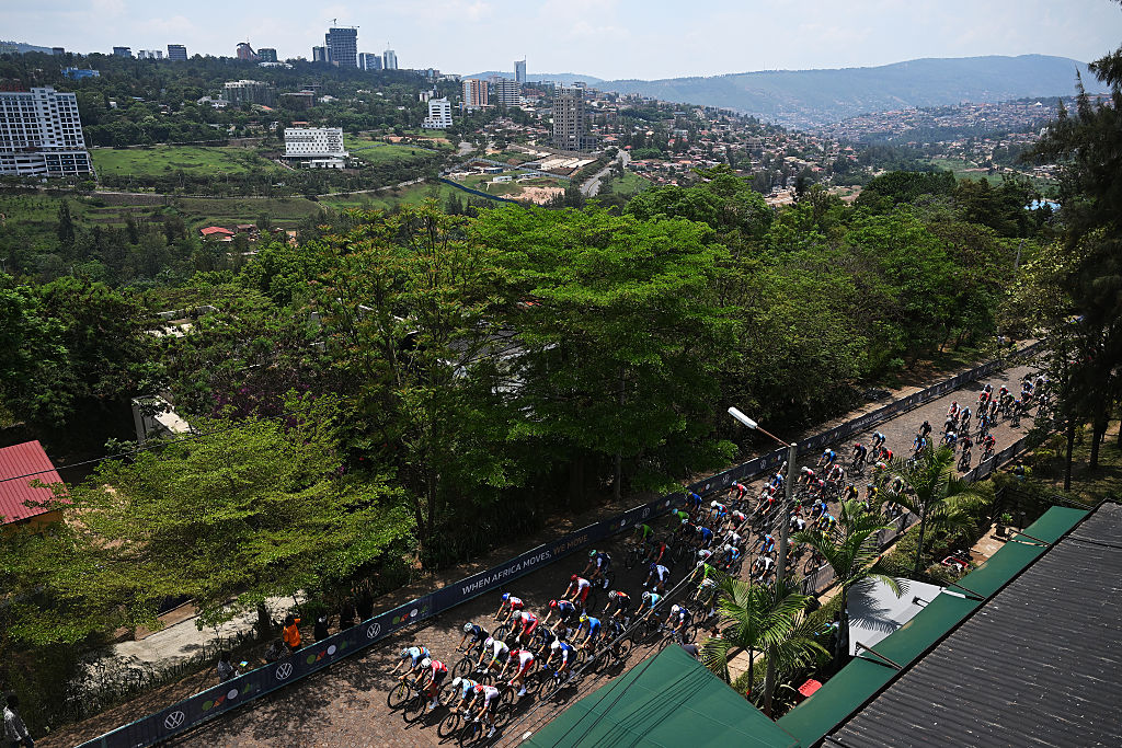 KIGALI, RWANDA - SEPTEMBER 26: A general view of the peloton passing through a landscape during the 98th UCI Cycling World Championships Kigali 2025, Men Under 23 Road Race a 164.6km race from Kigali to Kigali on September 26, 2025 in Kigali, Rwanda. (Photo by Dario Belingheri/Getty Images)