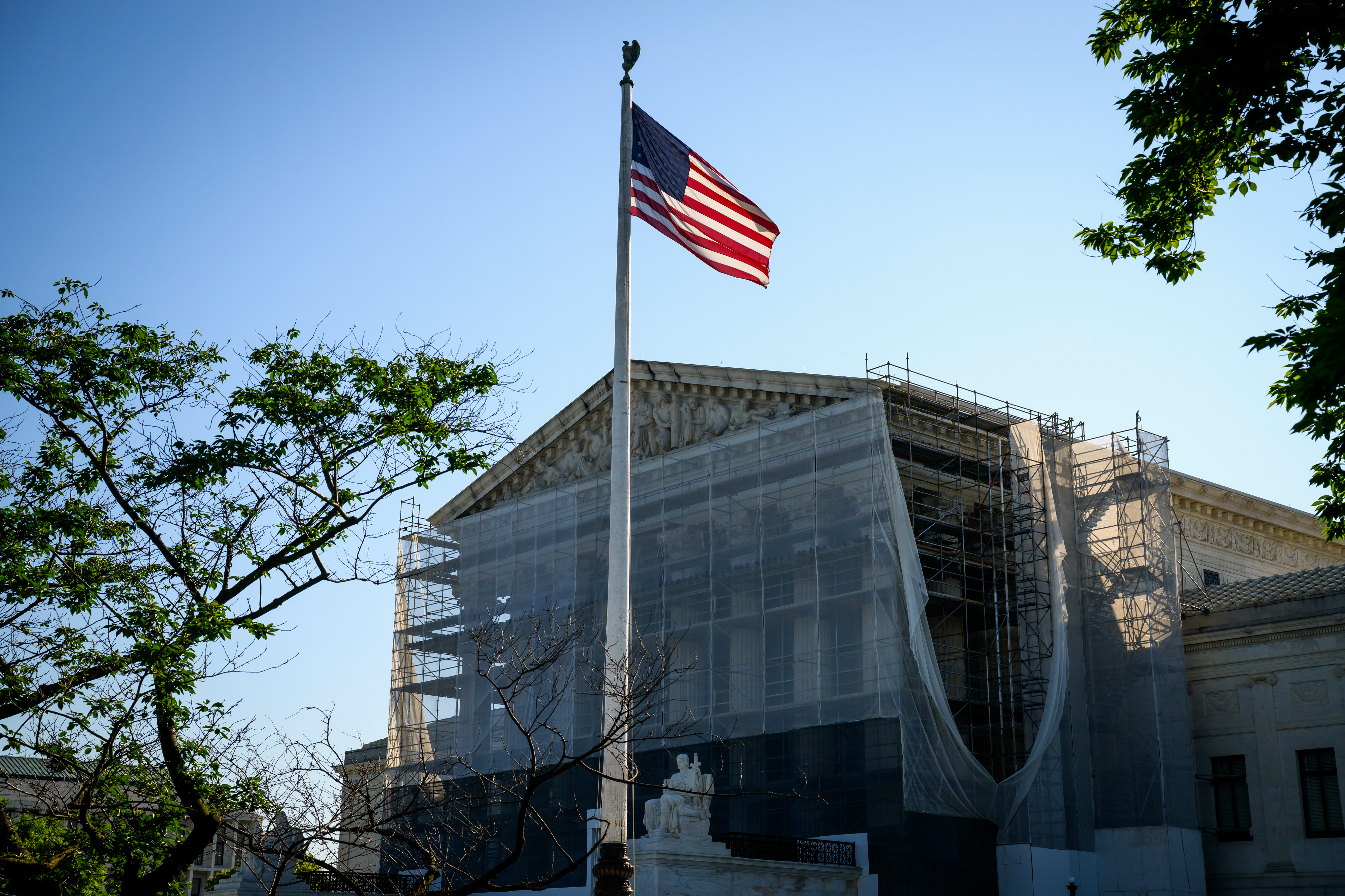 US Supreme court with flag outside