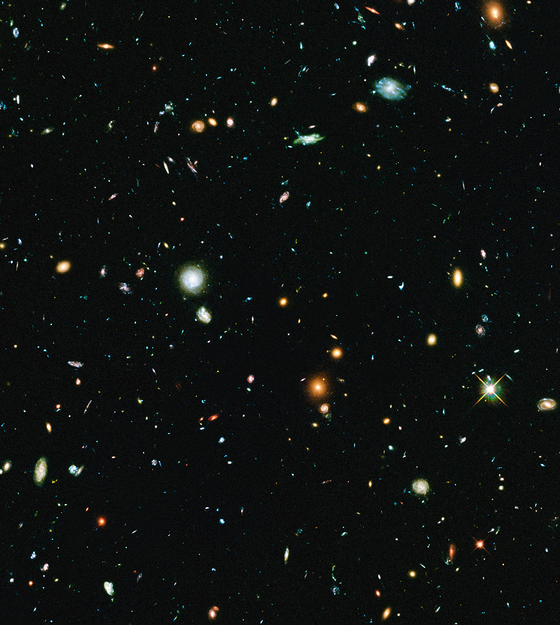This long-exposure Hubble Space Telescope image of massive galaxy cluster Abell 2744 is the deepest ever made of any cluster of galaxies. It shows some of the faintest and youngest galaxies ever detected in space. Abell 2744, located in the constellation Sculptor, appears in the foreground of this image.