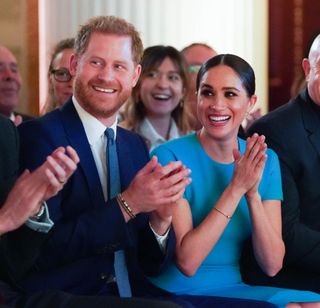 Prince Harry, Duke of Sussex and Meghan, Duchess of Sussex clapping and cheering in the audience at the annual Endeavour Fund Awards at Mansion House on March 5, 2020 in London, England.