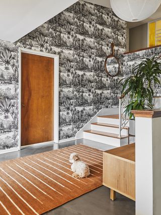 patterned entryway with modern staircase