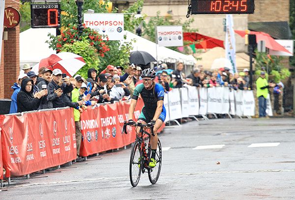 Lily Williams (Hagens Berman|Supermint) smiles with 0 laps to go as she takes the win