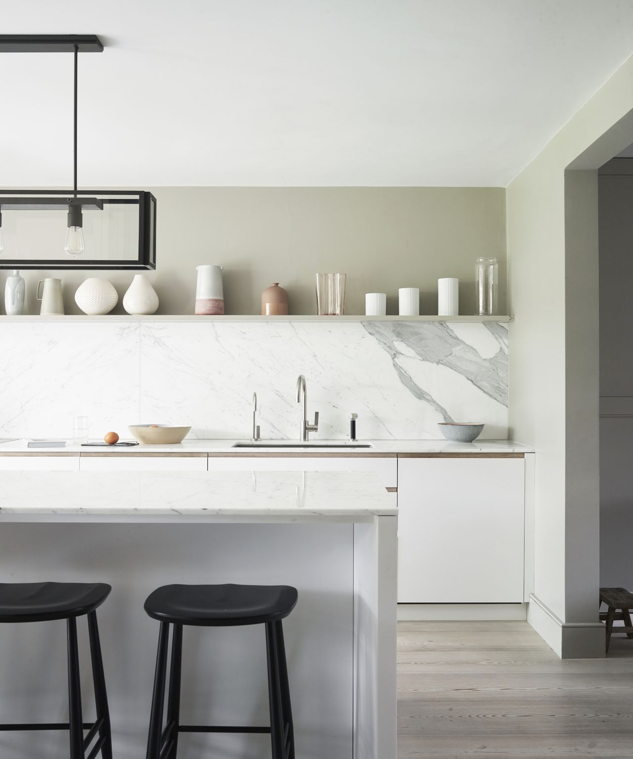 A modern house in London featuring a soothing color palette, distinctive art and furniture