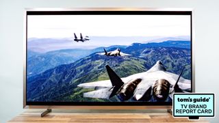 The Samsung S95H QD-OLED TV alongside a badge that reads: "Tom's Guide TV Brand Report Card"