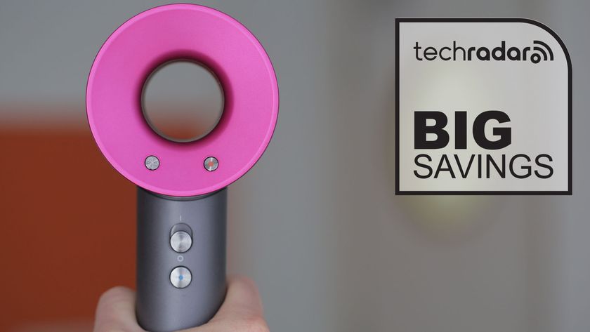 Dyson Supersonic Origin dryer next to a Big Savings graphic