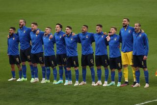 Italy players sing the national anthem ahead of their Euro 2020 final against England at Wembley in July 2021.