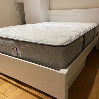 The Sealy Newton Posturepedic Mattress being tested
